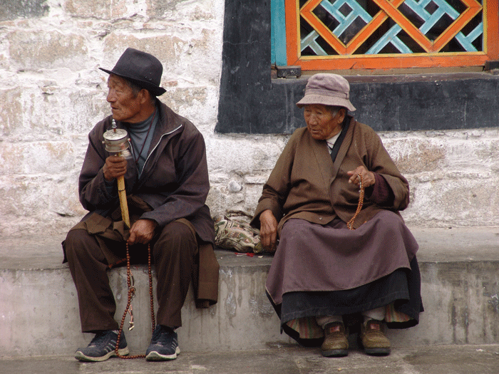Tibet - locals rest on the Barkhor